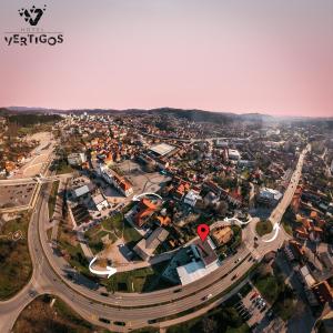 an aerial view of a city with a highway at Hotel Vertigos in Tuzla