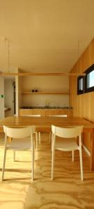 Televiisor ja/või meelelahutuskeskus majutusasutuses BLACK BOX CABAÑAS A