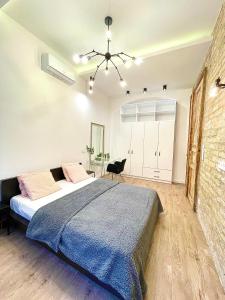Postel nebo postele na pokoji v ubytování Dream Design Apartment - 3 bedrooms & Finn Sauna
