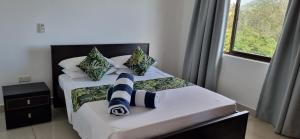 Postel nebo postele na pokoji v ubytování Otantik Residence