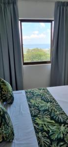 Postel nebo postele na pokoji v ubytování Otantik Residence