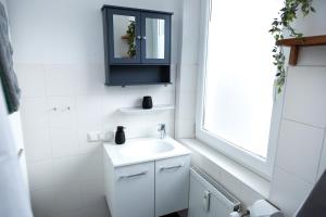 Ένα μπάνιο στο Entdecke das idyllische Allgäu - Verbringe deinen Traumurlaub in unserer gemütlichen Ferienwohnung