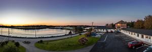 an aerial view of a parking lot next to a building at Novastar Motel On The Lake in Yarmouth