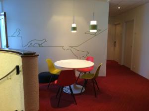 a dining room with a table and chairs at Hotel Isafjordur - Horn in Ísafjörður