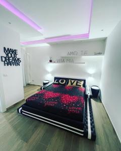 Posteľ alebo postele v izbe v ubytovaní Due Cuori Suite