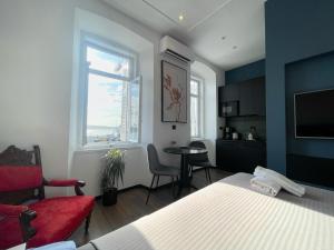 Posteľ alebo postele v izbe v ubytovaní Navis city apartments