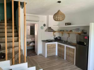 Kuchyň nebo kuchyňský kout v ubytování Enigma Suites