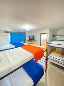 Krevet ili kreveti na sprat u jedinici u okviru objekta Hotel La Guajira