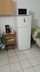 Køkken eller tekøkken på Gite Belvédère Deshaies + 3 billeder