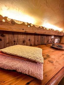 A bed or beds in a room at La Buca delle Fate