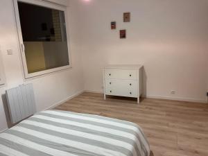 Posteľ alebo postele v izbe v ubytovaní Maison plein cœur de Rosendael