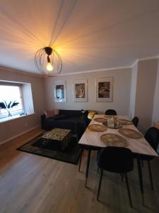 Posezení v ubytování Ferienhaus am Naherholungsgebiet mit SAUNA