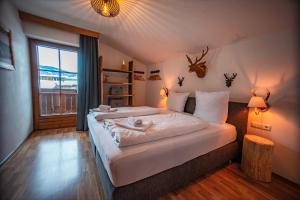 Ένα ή περισσότερα κρεβάτια σε δωμάτιο στο Appartment Haus Bergtraum