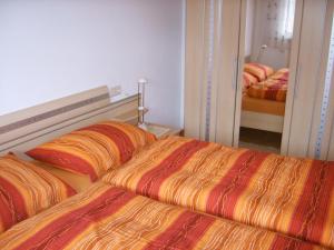 Posteľ alebo postele v izbe v ubytovaní Roanerhof