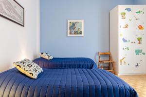 En eller flere senge i et værelse på Arcus Pacis - Large Central Flat