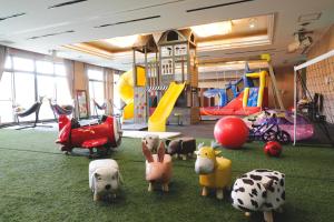 a play room with many different types of playground equipment at たまご肌美人の湯　美榛苑 in Uda