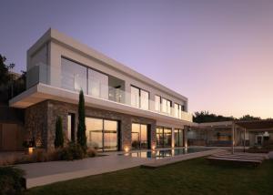 a large house with a lot of windows at Villa Ammos in Ferma