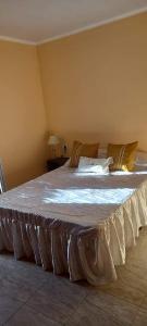 Giường trong phòng chung tại Sito y Pocha