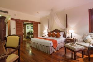 Letto o letti in una camera di Palace Residence & Villa Siem Reap