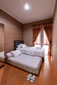 Легло или легла в стая в Spacious, White-villa Belgareti @Kiara Condong