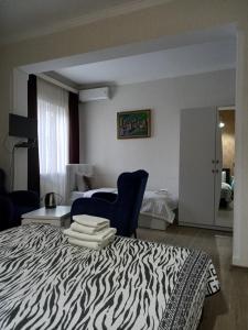 Postel nebo postele na pokoji v ubytování Hotel Zaira