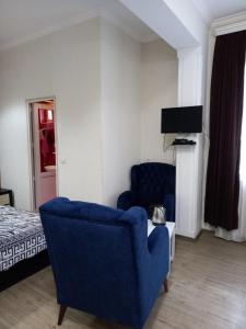 TV a/nebo společenská místnost v ubytování Hotel Zaira