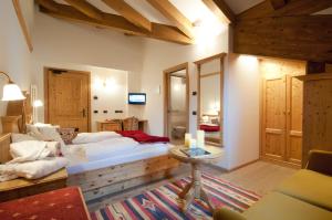 Ένα ή περισσότερα κρεβάτια σε δωμάτιο στο Hotel Gianna
