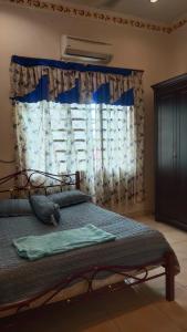 Postel nebo postele na pokoji v ubytování Zulkifli Homestay Tambun,Ulu kinta,Tg Rambutan