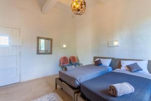 Katil atau katil-katil dalam bilik di POOL & SPA - wellness VILLA St Martin