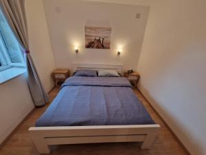 Postel nebo postele na pokoji v ubytování Lavanda apartman 1 + 19 fotografií
