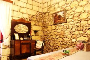 Voodi või voodid majutusasutuse Il-Bàrraġ Farmhouse B&B - Gozo Traditional Hospitality toas