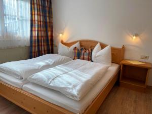 Postel nebo postele na pokoji v ubytování Chalet Zauberflöte