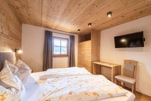 Posteľ alebo postele v izbe v ubytovaní Agriturismo Lüch de Vanc