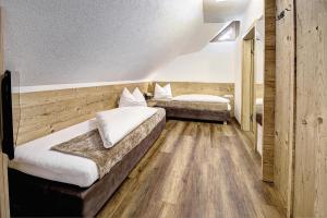 Voodi või voodid majutusasutuse Hotel Ferienglück toas