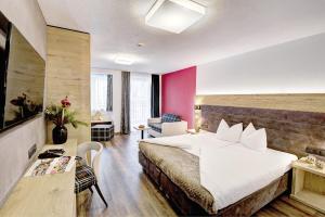 Voodi või voodid majutusasutuse Hotel Ferienglück toas