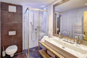 Vannituba majutusasutuses Hotel Ferienglück