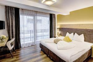 Voodi või voodid majutusasutuse Hotel Ferienglück toas