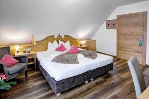 Voodi või voodid majutusasutuse Hotel Ferienglück toas