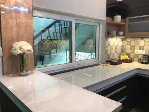 Kuchyň nebo kuchyňský kout v ubytování Mariya Condo hotel