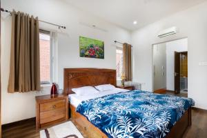 Un pat sau paturi într-o cameră la InnBox Farmstay - Rajpura Punjab