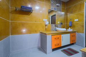 a bathroom with a sink and a mirror at InnBox Farmstay - Rajpura Punjab in Banūr +27 photos