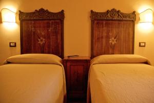 Posteľ alebo postele v izbe v ubytovaní Agriturismo La Sovana