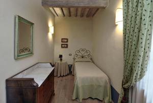 Posteľ alebo postele v izbe v ubytovaní Agriturismo La Sovana