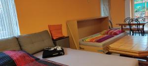 Posezení v ubytování Gästewohnung am Thümmlitzwald