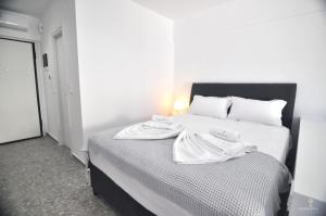 Posteľ alebo postele v izbe v ubytovaní Zennova Sirene Luxury Studios
