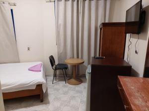 TV a/nebo společenská místnost v ubytování Canary Hotel