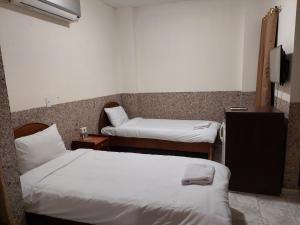 Postel nebo postele na pokoji v ubytování Canary Hotel + 36 fotografií