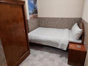Postel nebo postele na pokoji v ubytování Canary Hotel