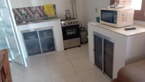 Küche/Küchenzeile in der Unterkunft Casa Residencial Duque de Caxias