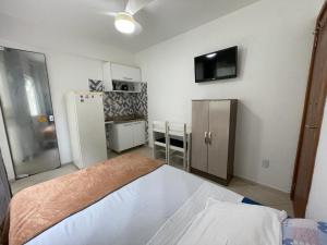 Ένα ή περισσότερα κρεβάτια σε δωμάτιο στο Apartamento Onda Azul